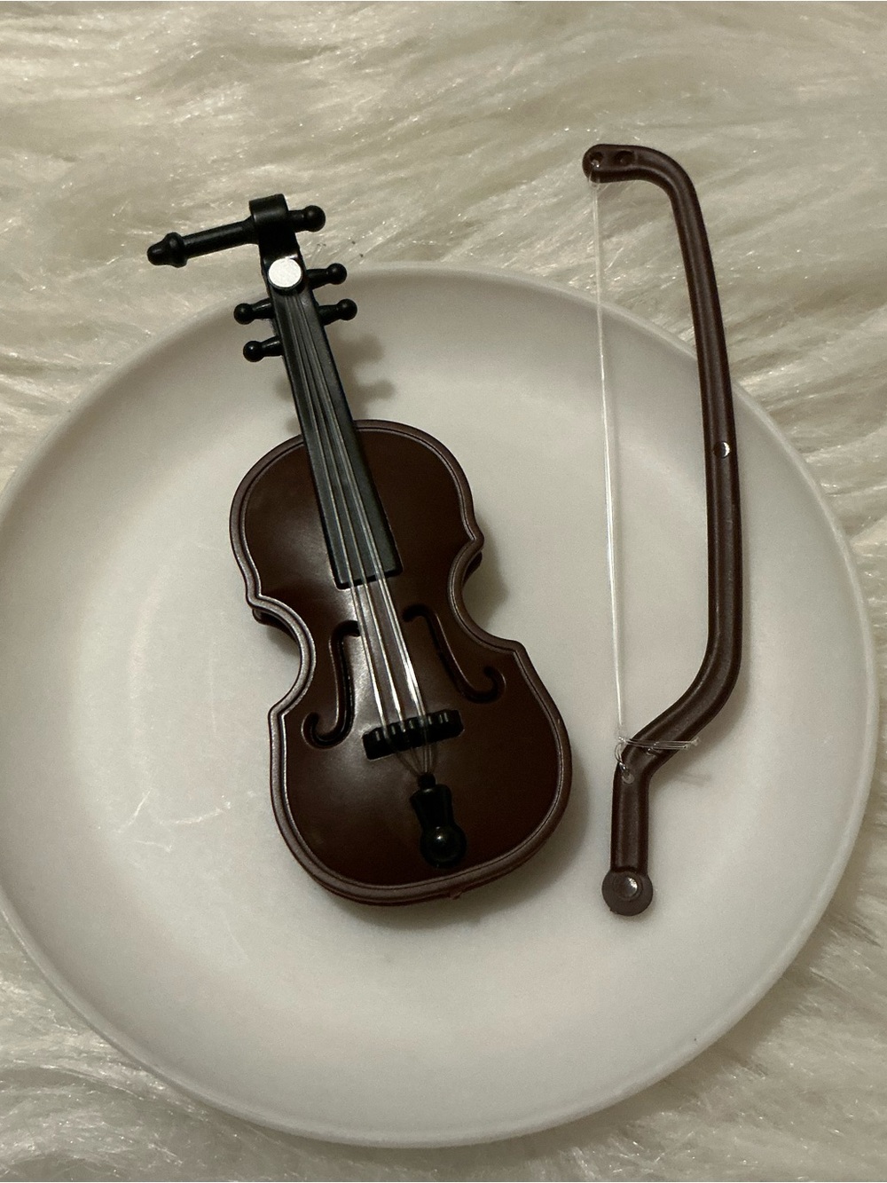 Brown miniature dollhouse violin and bow